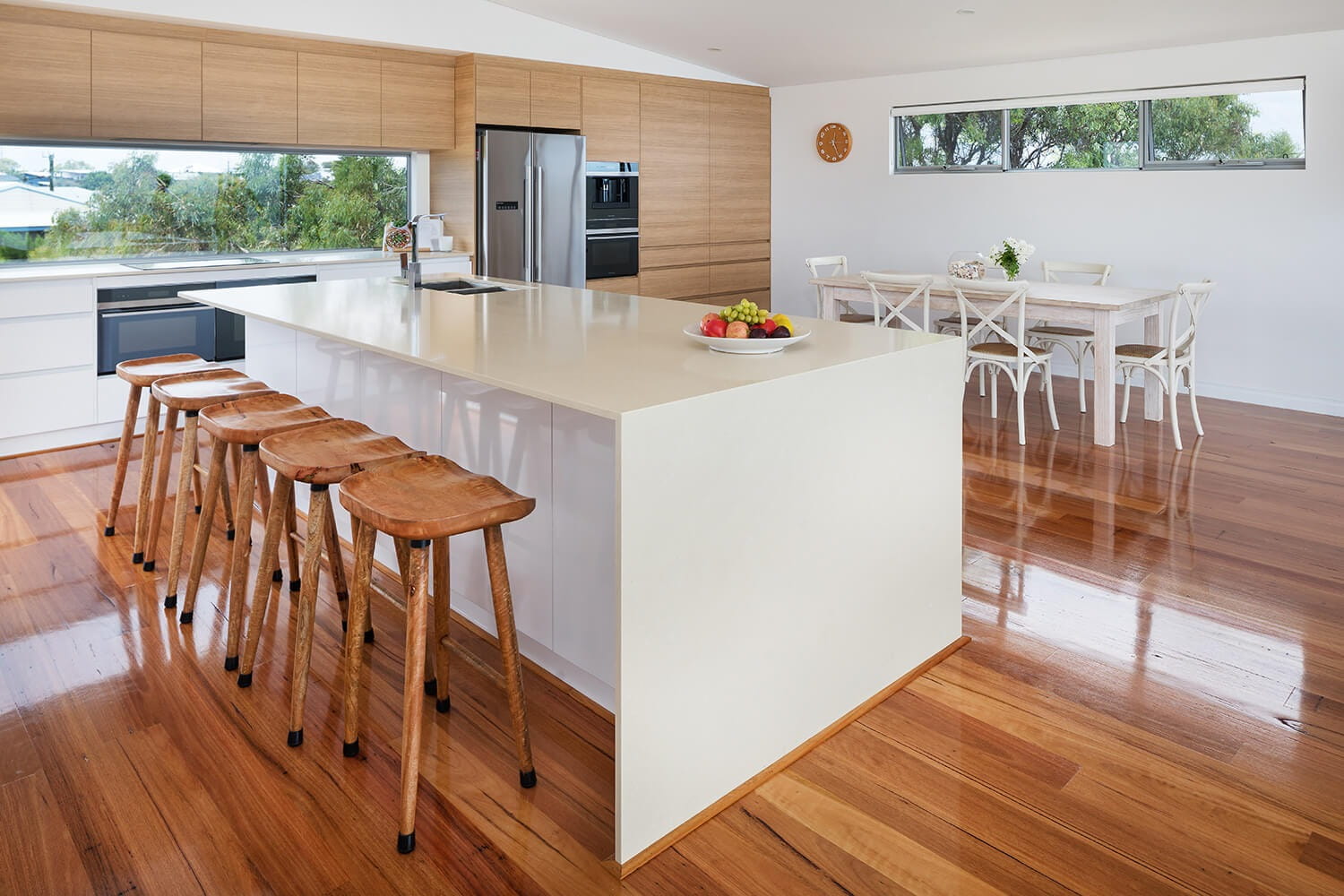 Oversized kitchen island in Makin Homes' Panamuna Drive three-storey home