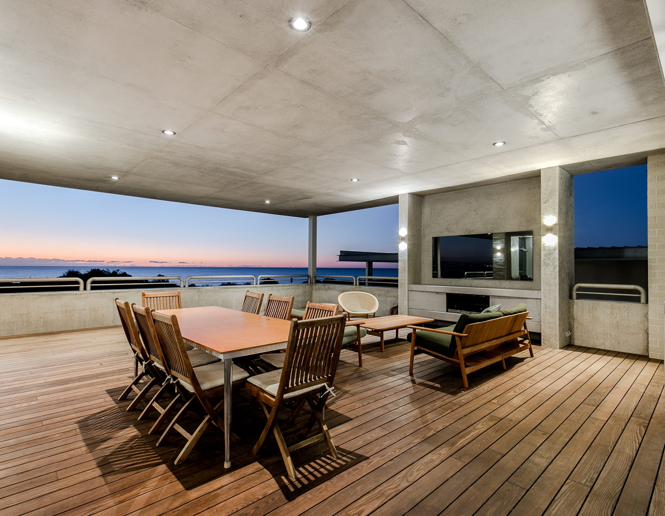 Luxury Outdoor Alfresco Area with Timber Decking, Dining Setting and Ocean Views