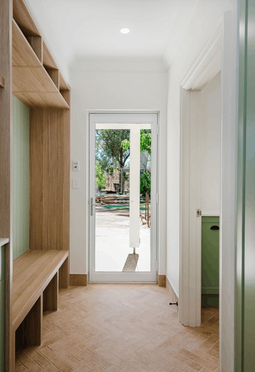 Minimalist Home Entryway with Built-in Timber Seating, Storage and Natural Light